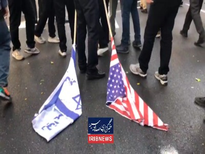 پرچم آمریکا و رژیم صهیونیستی زیر پای دهه نودی‌ها