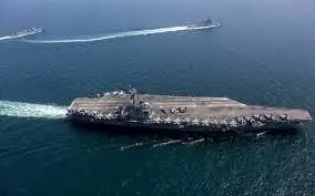 تنش دریایی اوج گرفت؛ شلیک ناو هواپیمابر آمریکا به پهپاد ایرانی / ایران پهپادی دیگر اعزام کرد/ عکس