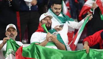 تصویر رهبر شهید انقلاب روی لباس هواداران ایران در آمریکا